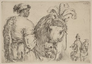 A Black Man Feeding a Horse