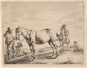 A Man Holding a Horse by His Bridle