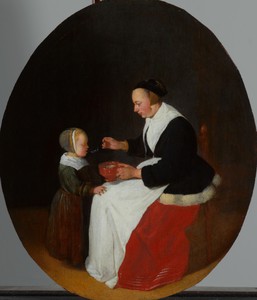 A Mother Feeding Porridge to her Child