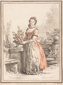 A Young Woman Standing in a Park