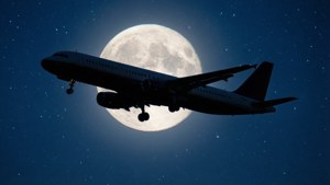 Airplane Silhouette and Moon