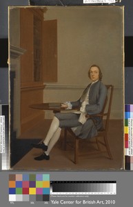 An Unknown Man Seated at a Table