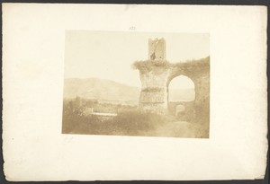[Arch and tower ruins]