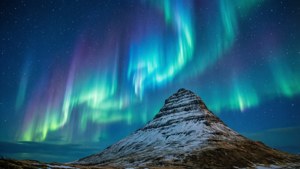 Aurora Over Snowy Peak