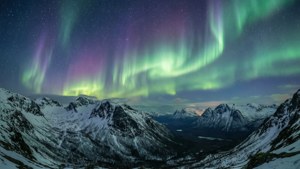 Aurora Over Snowy Peaks