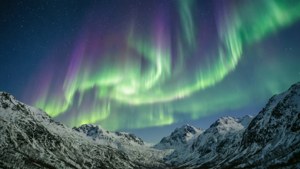 Aurora Over Snowy Peaks