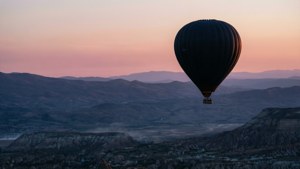 Balloon Over Valley Silhouette