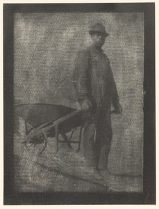 [Black Man with Wheelbarrow]