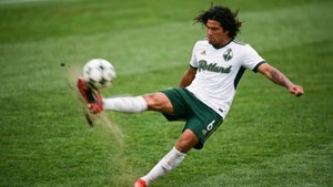 Blanco Kicking the Ball
