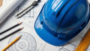 Blue Hard Hat on Blueprint
