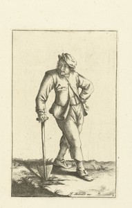 Boer leunt op schop