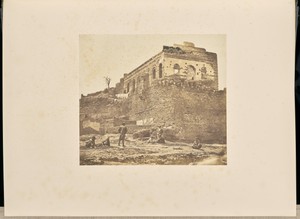 [Building ruins from below]