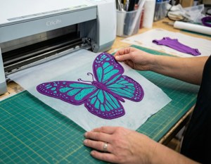 Butterfly SVG Onesie on Cutting Mat