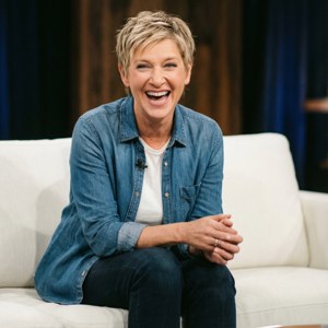Candid Laugh on White Couch