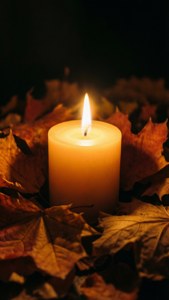 Candle and Autumn Leaves