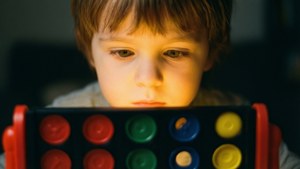 Child Playing Connect 4