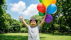 Child with Balloons