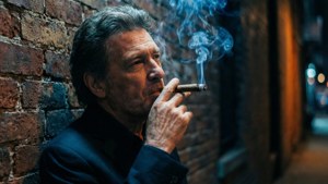 Cigar and Brick Wall