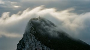 Clouds Embracing the Rock