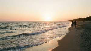 Couple Walking at Sunset