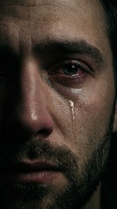 Crying Man in Shadows