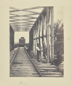 [Destroying a truss bridge]