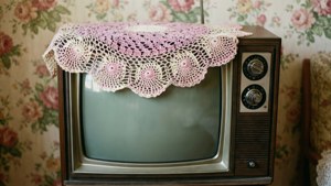 Doily on Round Screen TV