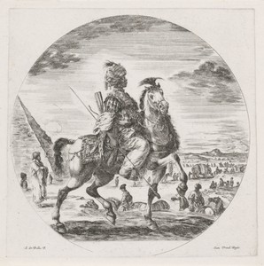 Donkere man met tulband en speer te paard