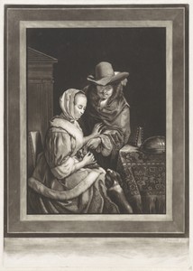 Een man en een vrouw met twee honden