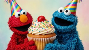 Elmo and Cookie Monster Share