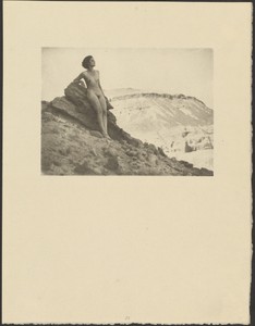 [Female Nude on Rocky Cliff]