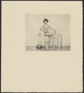 [Female Nude Posed With Glass Jars]