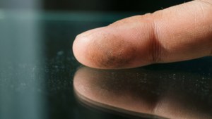 Finger Touching Glass