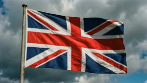 Flag Waving in Stormy Sky