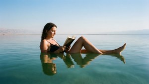 Floating Reader at Sunset
