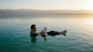 Floating Reader at Sunset