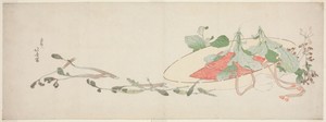 Flowers and spring greens in a hat
