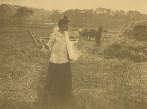 [Gertrude O'Malley in Field with Rake]