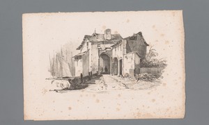 Gezicht op een gebouw met poort bij een haven
