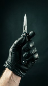 Gloved Hand Switchblade
