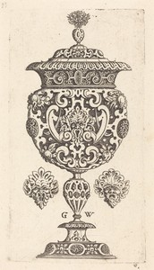 Goblet, rim decorated with masque with  gaping mouth