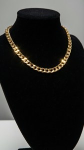 Gold Chain on Mannequin Bust