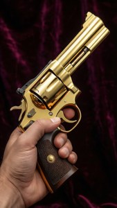 Golden Revolver Hand