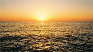 Golden Sunrise Over Ocean