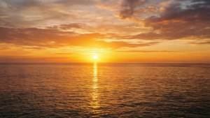 Golden Sunrise Over Ocean
