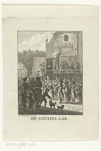 Goochelaar treedt op voor publiek op kermis