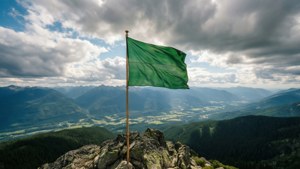 Green Flag on Mountain Peak