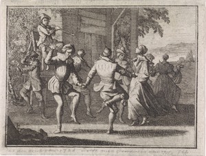 Groep dansende figuren in de open lucht