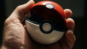 Hand Holding Pokéball