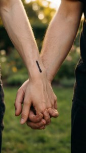 Hands Holding Semicolon